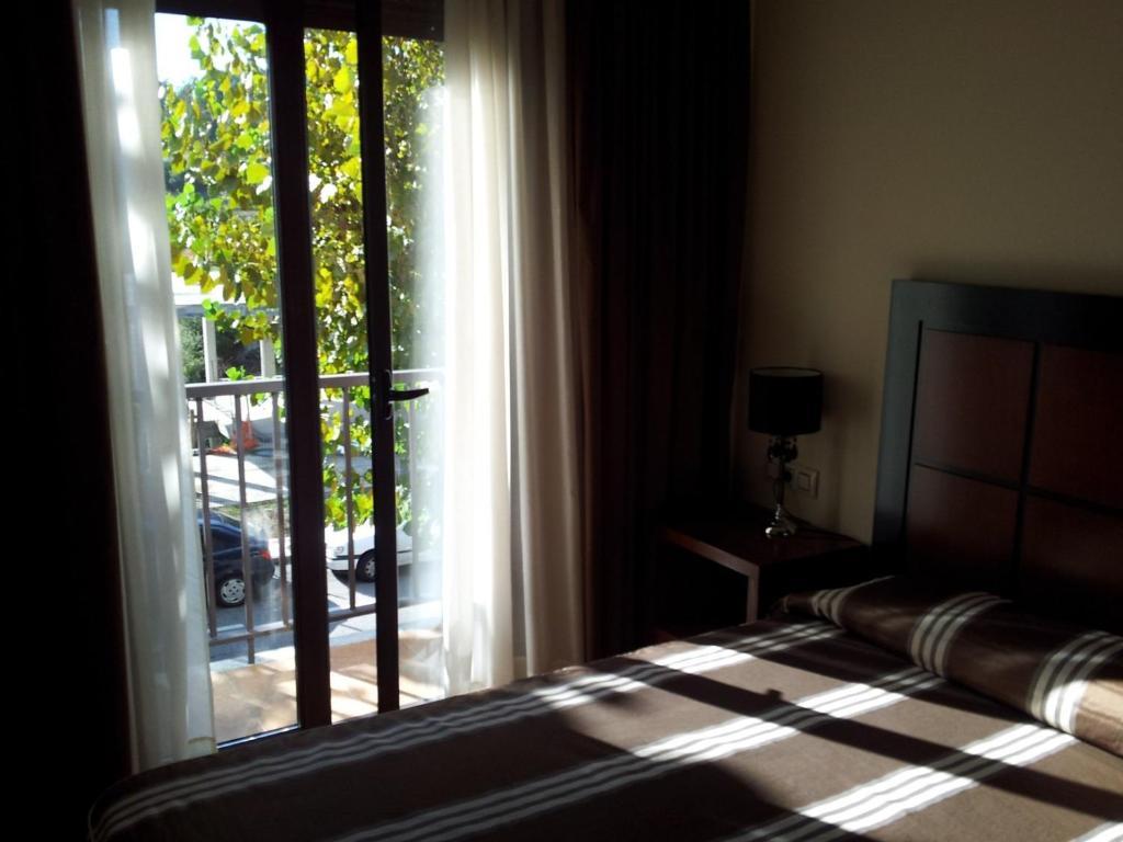 Hotel Av Apartamentos Лобиос Стая снимка